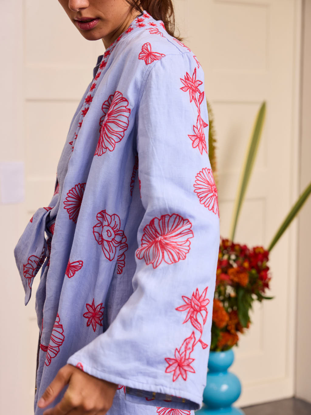 Chili Pepper Coat Red Flowers on Pastel Blue