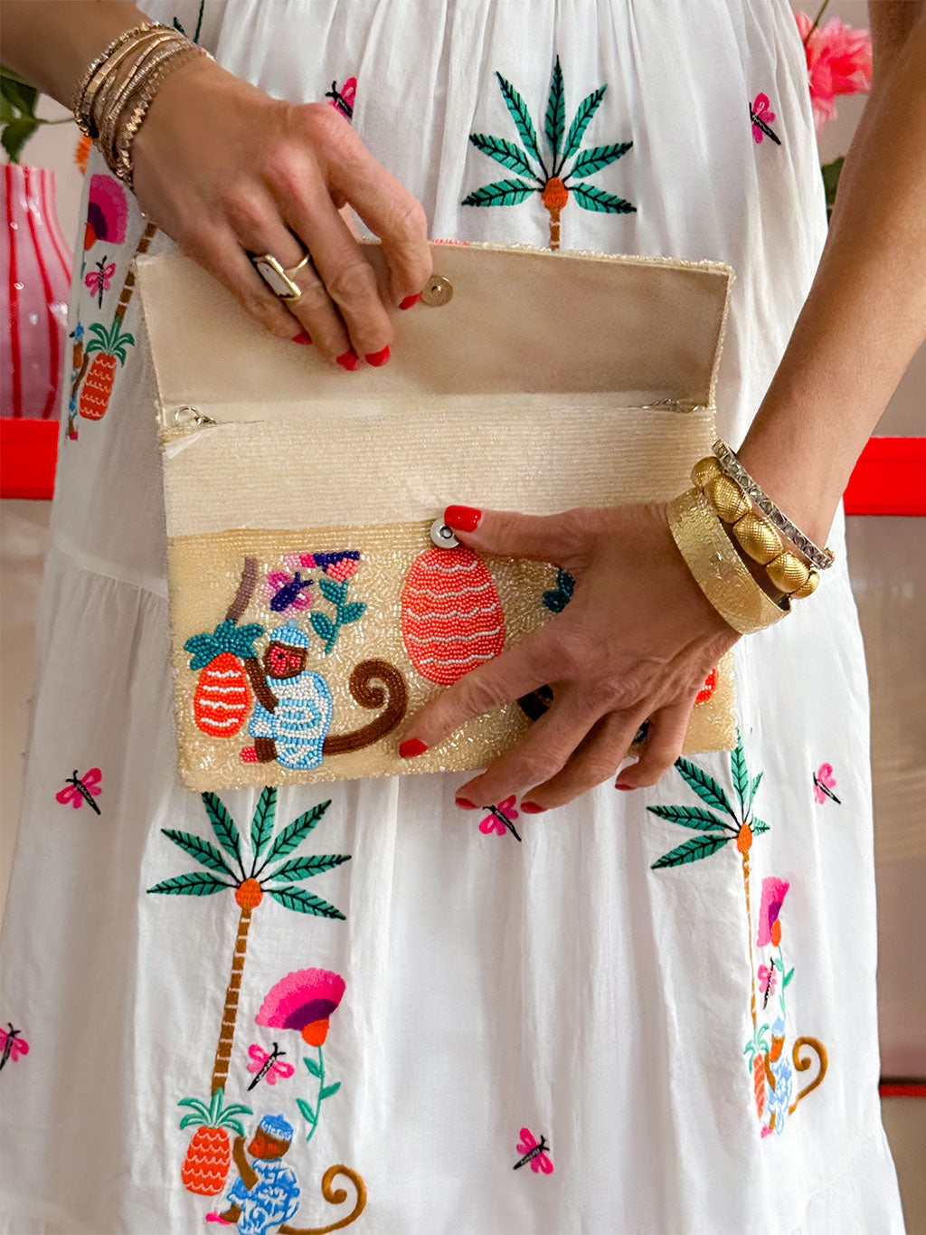 Handcrafted glass seed bead clutch bag with colourful monkey, palm tree and pineapple design by Nimo With Love