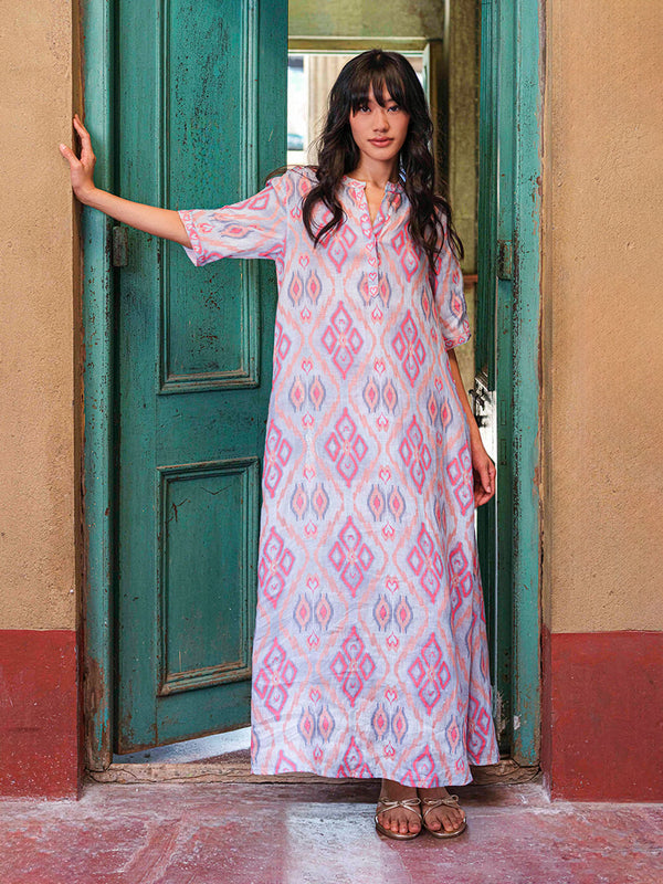Model showcasing the fluid movement and sophisticated, modest fit of the Cassia linen maxi dress