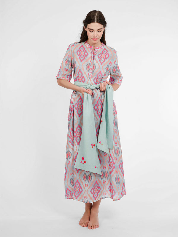 Model wearing the Cassia dress cinched with the contrasting Scarf Belt Mint for a high-impact, defined waist.