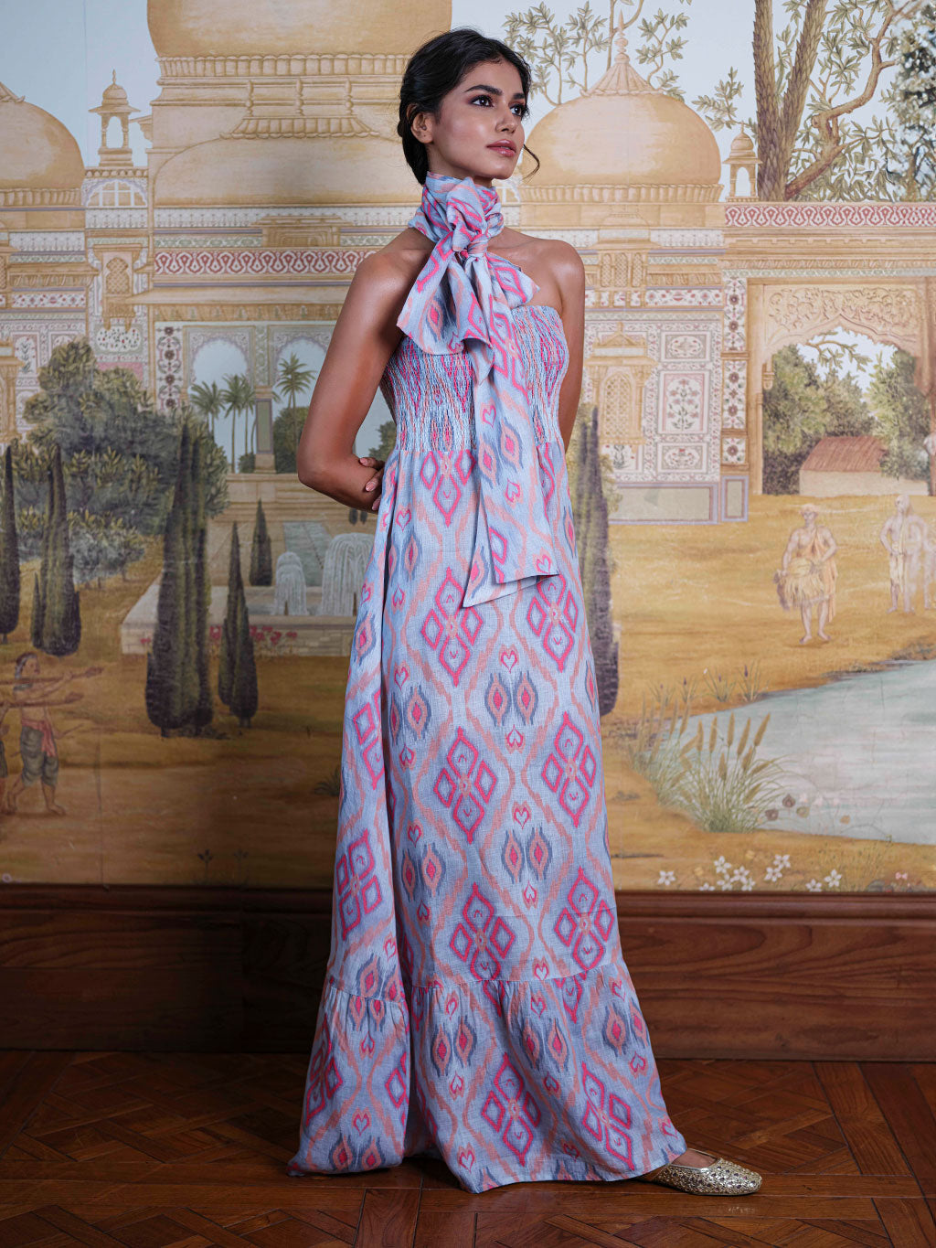 Model wearing the Caraway dress styled with the matching Scarf Belt as a dramatic, oversized neck bow.