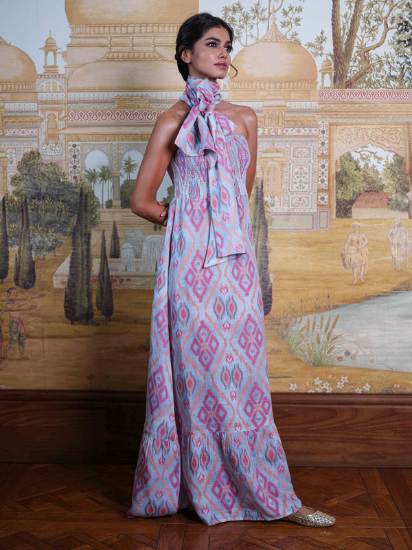 Model wearing the Caraway dress styled with the matching Scarf Belt as a dramatic, oversized neck bow.