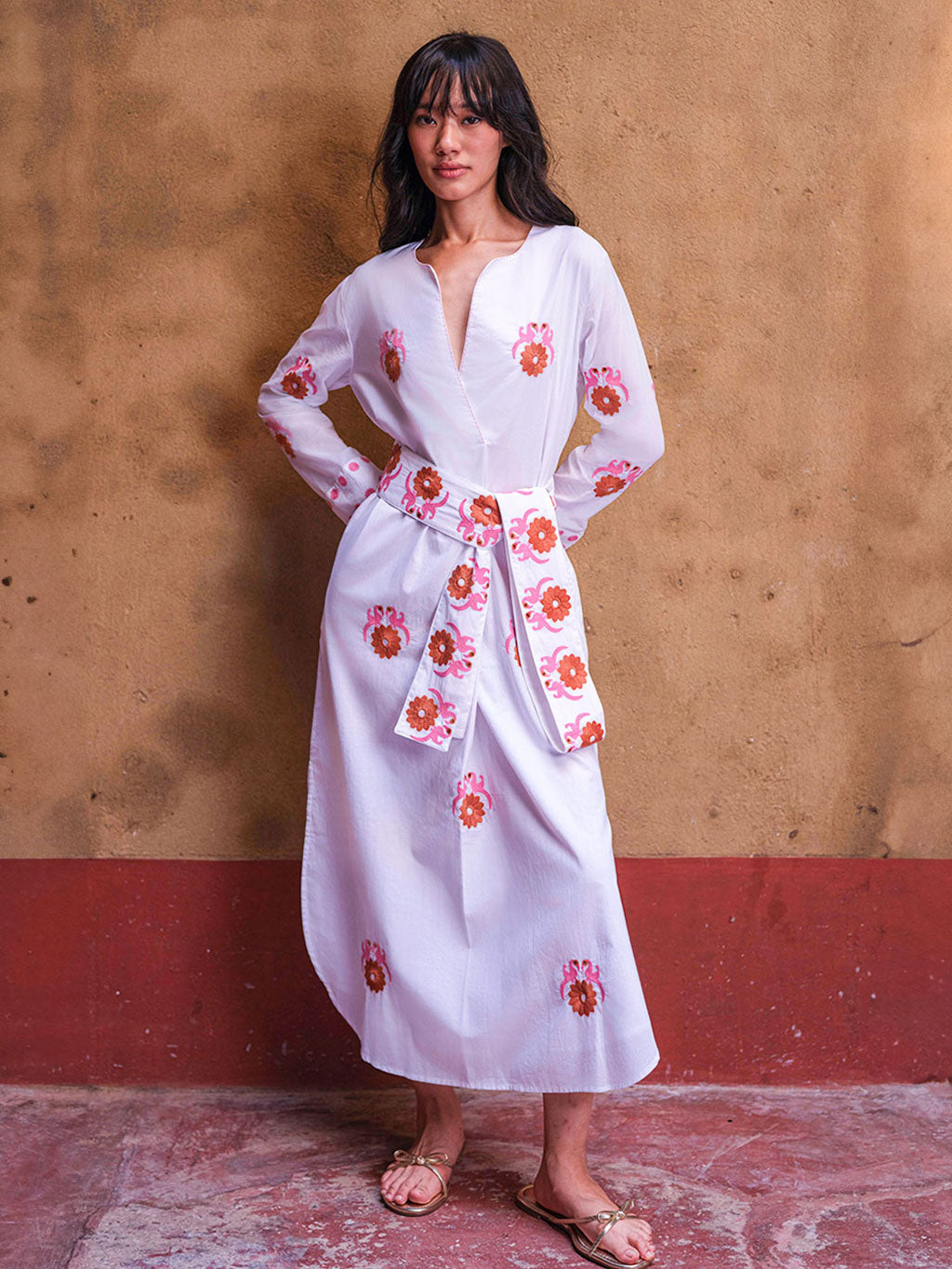 Model wearing the Amethyst Kaftan dress styled with a belt, showcasing the effortless drape and artisanal craftsmanship of the organic cotton fabric.