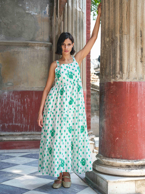 Model wearing the Cornflower dress in an Indian palace, embodying effortless bohemian summer style.