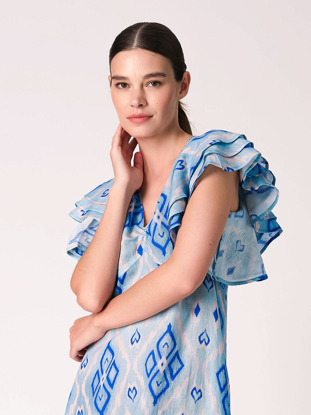 An Ikat linen maxi dress with ruffled statement sleeves and V-neck