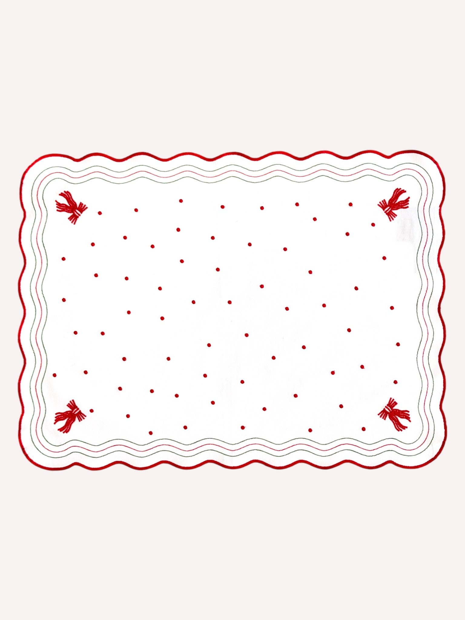Rectangular Christmas placemat with red border and small red birds on a white background