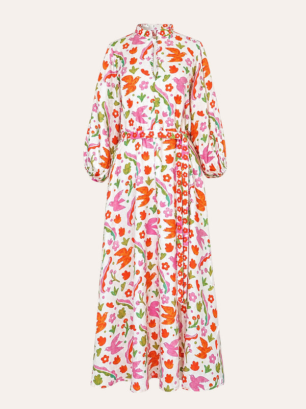 White Marigold linen maxi dress by Nimo With Love featuring a vibrant pink and orange botanical Mexico print.