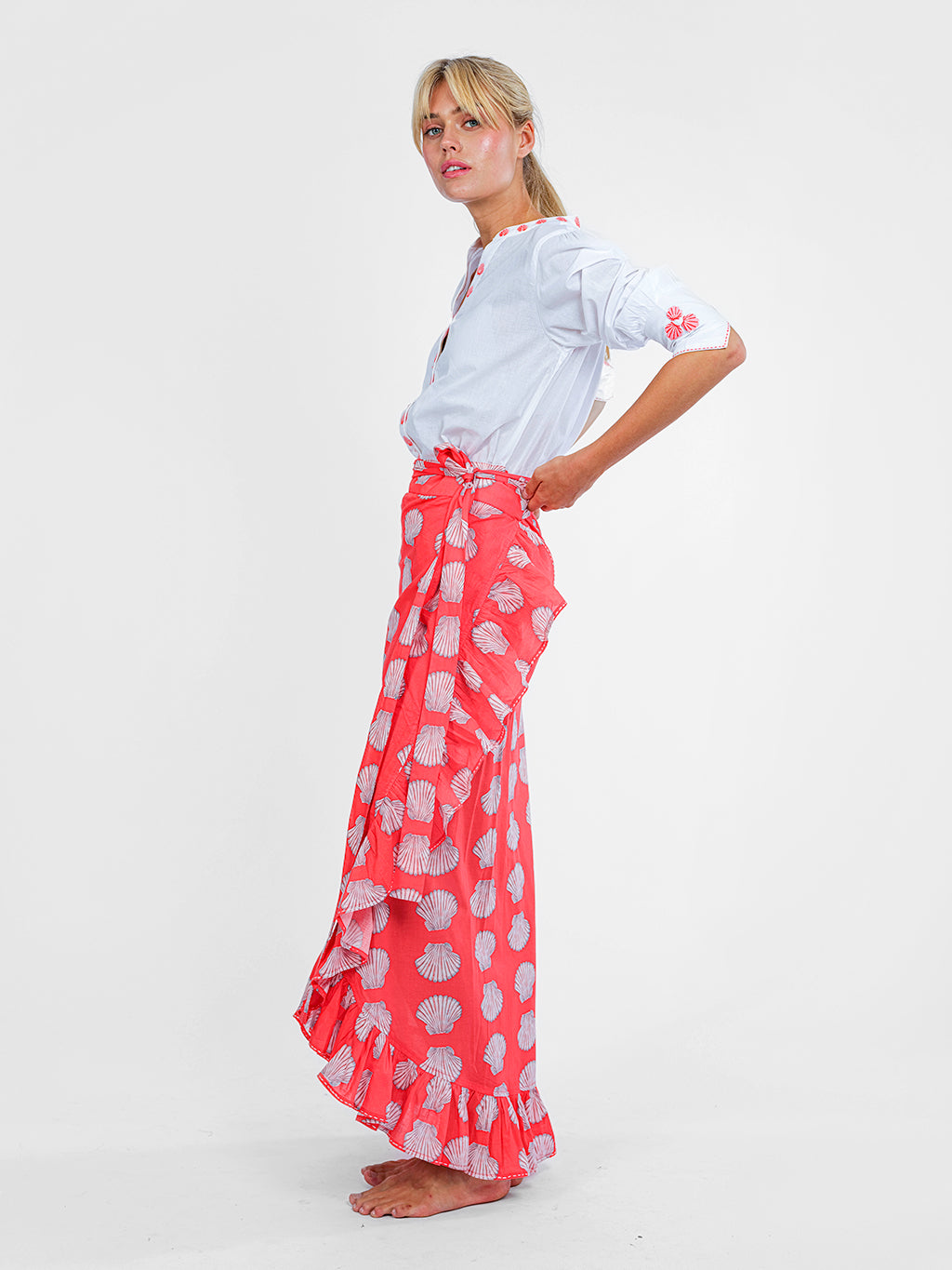 Elegant maritime look featuring the ruffle wrap skirt in red