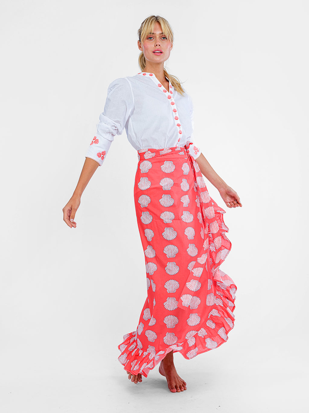 Red organic cotton wrap skirt with white shell print by Nimo With Love