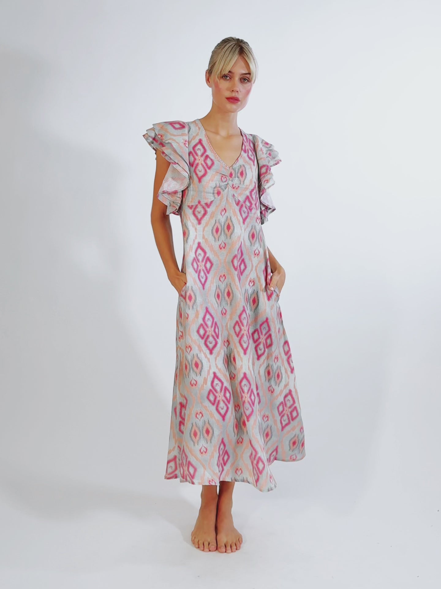 Video showcasing the fluid movement and sculptural silhouette of the linen Belladonna dress.