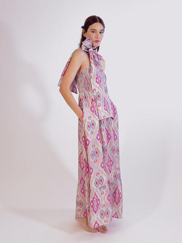 Video showcasing the breezy, elegant movement of the Caraway linen dress, perfect for a high-summer event.