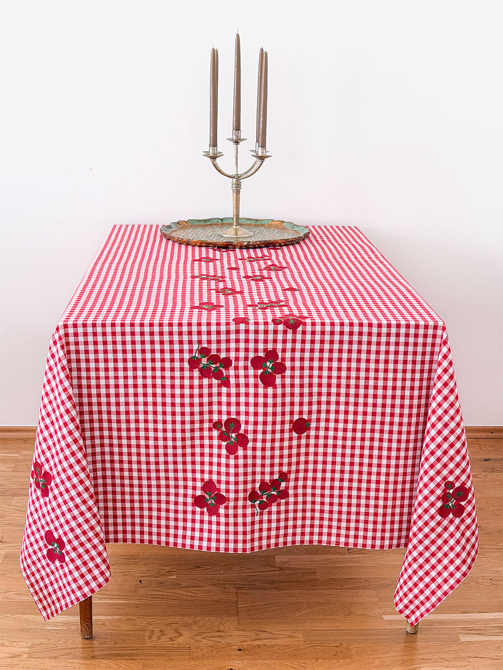 Nimo x Stefania Lettini luxury red gingham tablecloth featuring artisanal hand-guided tomato embroidery